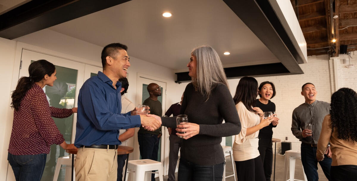 Networking at a Toastmasters meeting Networking at a Toastmasters meeting